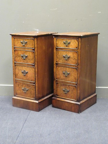 Lot 420 - A pair of veneered bedside cabinets, each with...