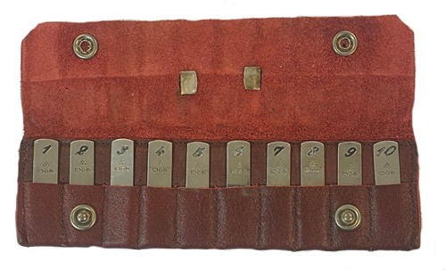 Lot 382 - A cased set of late 20th century silver place or butt markers
