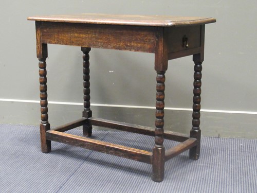 Lot 458 - An early 20th century oak side table with...