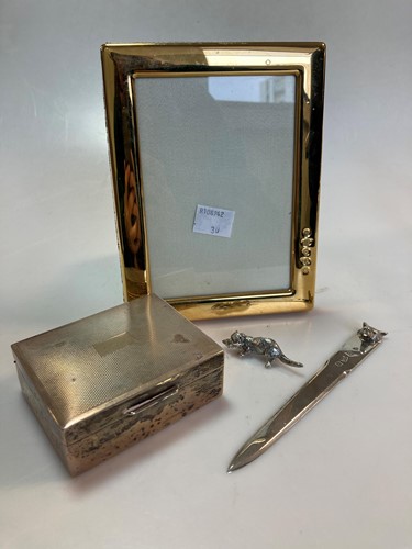 Lot 255 - A silver fox mask letter opener, together with...