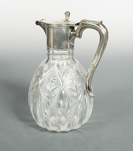Lot 533 - An Edward VII silver topped cut glass claret jug