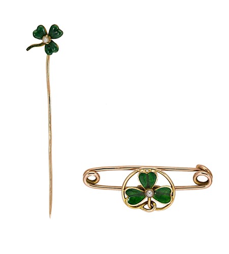 Lot 147 - An enamelled shamrock brooch together with an enamelled shamrock stick pin