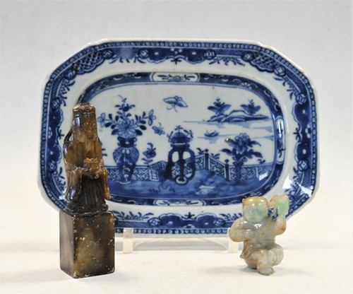 Lot 158 - A Chinese carved jadeite small figure of a boy holding a lotus leaf, late Qing Dynasty, circa 1890