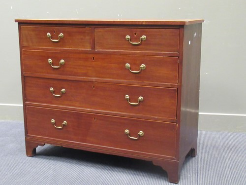 Lot 585 - A 19th century mahogany chest of two short...