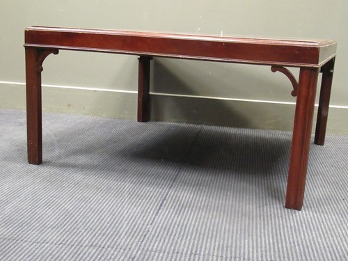 Lot 636 - A 20th century mahogany coffee table, 37 x 93...