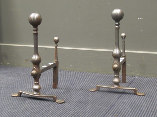 Lot 652 - A pair of steel fire dogs (2)
