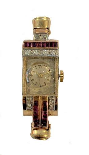 Lot 329 - Unsigned - A ruby and diamond set Art Deco style cocktail watch head