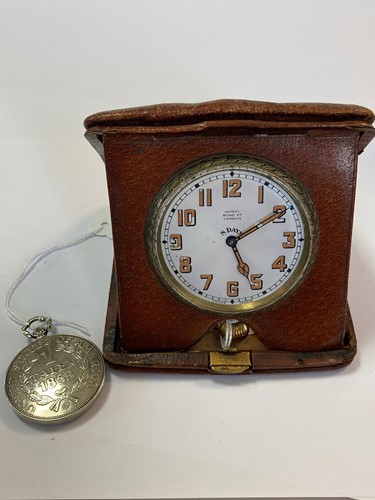 Lot 228 - Asprey - a folding travelling bedside clock in...