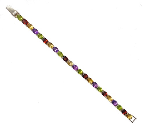 Lot 3 - A multi-gem set line bracelet