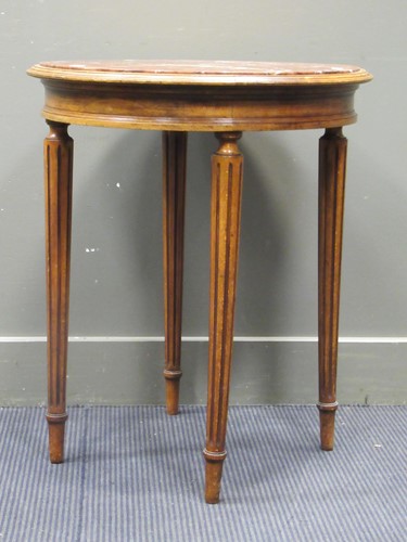 Lot 594 - A circular occasional table with inset marble...