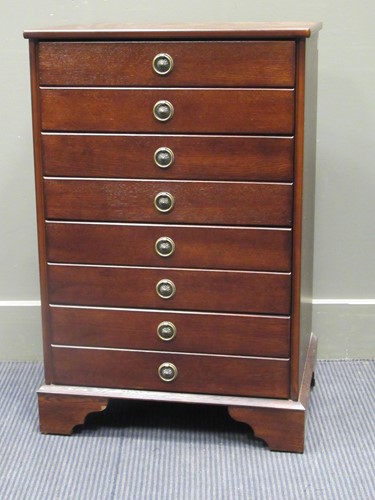 Lot 478 - A modern hardwood compact chest of drawers, 78...