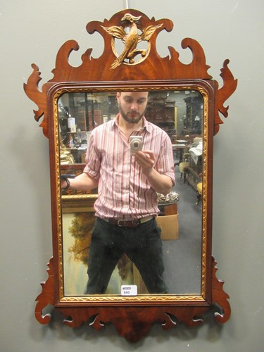 Lot 680 - A George III style mahogany and parcel gilt...