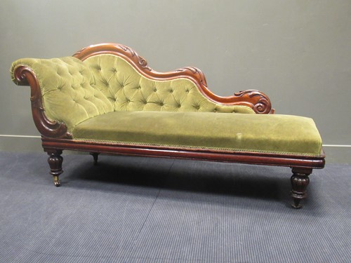 Lot 595 - A Victorian carved mahogany frame chaise...