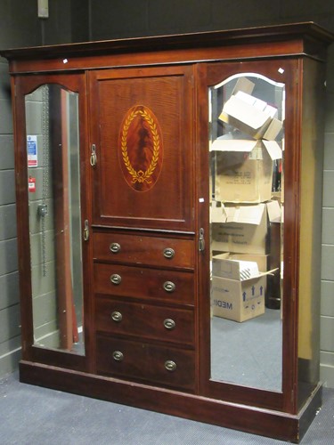 Lot 479 - An Edwardian mahogany combination wardrobe,...