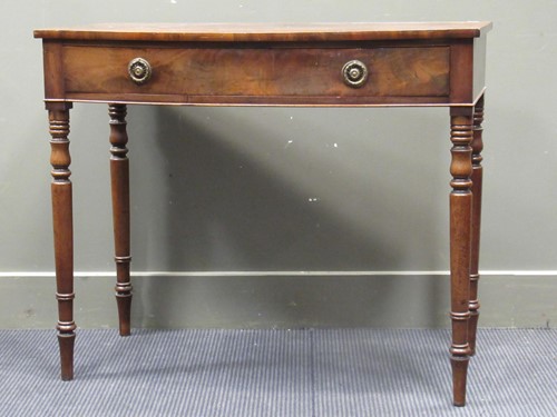 Lot 639 - A Regency mahogany bow fronted side table,...