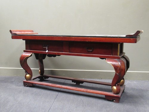 Lot 600 - A South East Asian stained wood and parcel...