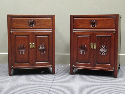 Lot 630 - A pair of modern Chinese hardwood bedside...