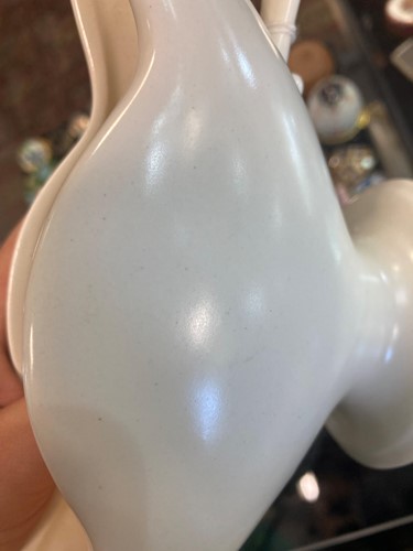 Lot 81 - William John Marriner for Fulham Pottery, twin...