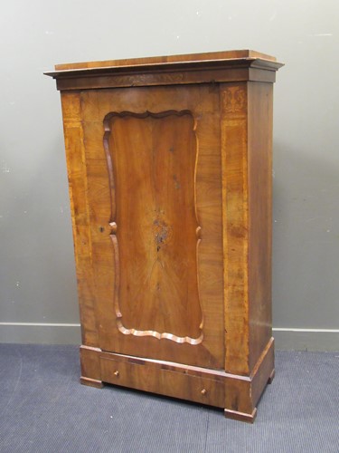 Lot 522 - A 19th century mahogany and maple wardrobe,...