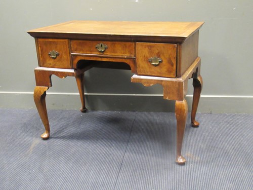 Lot 563 - A walnut and oak low boy, 74 x 98 x 56cm