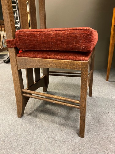 Lot 175 - In the manner of Charles Rennie Mackintosh, a modern oak dining table and four chairs