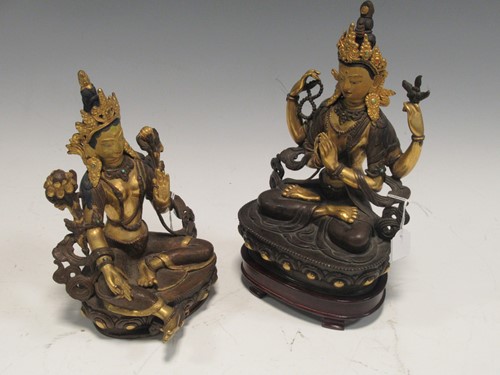 Lot 87 - Two Eastern bronze, gilt and painted female...