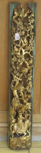 Lot 137 - A Chinese painted and gilt carved vertical...