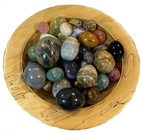 Lot 341 - A collection of 41 polished hardstone eggs