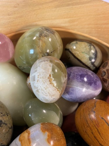 Lot 341 - A collection of 41 polished hardstone eggs