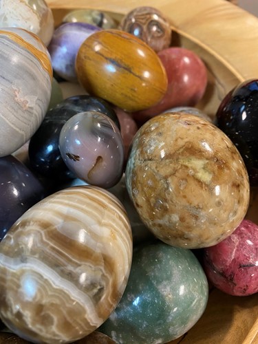 Lot 341 - A collection of 41 polished hardstone eggs