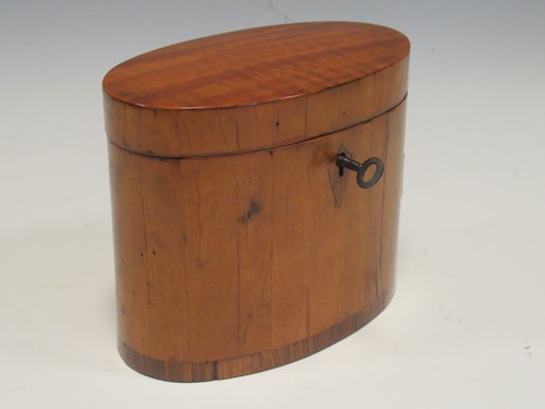 Lot 162 - A George III satinwood oval tea caddy 15cm wide