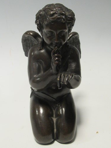 Lot 92 - A bronze model Cupid, 19th century, 11cm high