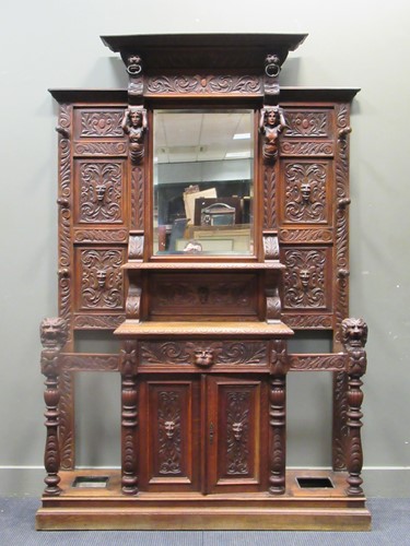 Lot 455 - A Victorian carved oak hallstand with mirror...