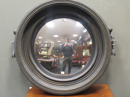 Lot 456 - A 19th century circular convex wall mirror...