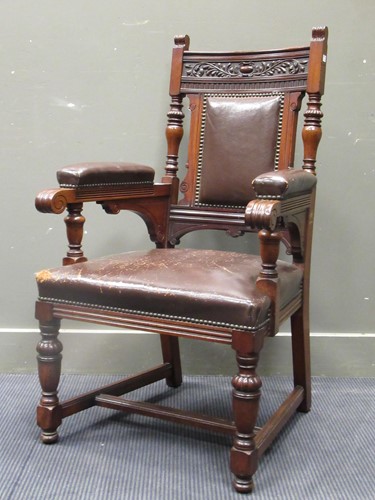 Lot 454 - A late Victorian carved mahogany elbow chair...