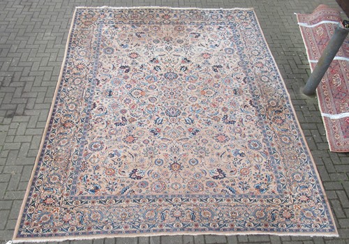 Lot 711 - A Persian Kashan carpet