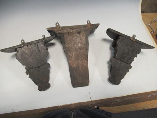 Lot 56 - Three antique wooden brackets and two other...
