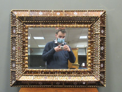 Lot 472 - A back painted glass and gilt frame...