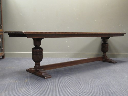 Lot 466 - A long oak refectory table, the rectangular...