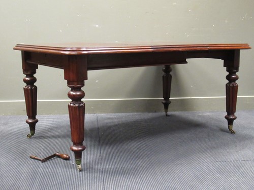 Lot 500 - A Victorian mahogany dining table with one...