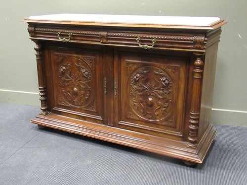 Lot 463 - A Continental carved oak sideboard with later...