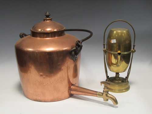 Lot 144 - A large 19th century hot water pot with brass...