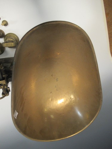 Lot 118 - A set of cast iron kitchen scales with a...