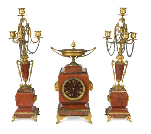 Lot 411 - A French red marble and gilt metal garniture de cheminee, 19th century