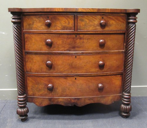 Lot 573 - A Victorian mahogany bow front chest fitted...