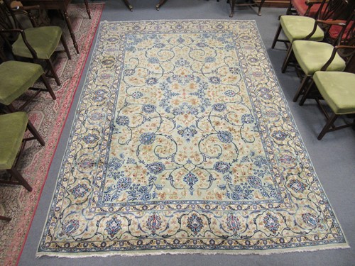 Lot 715 - A Persian Kashan carpet decorated with...