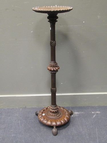 Lot 448 - A torchere with “ivory” button decoration...