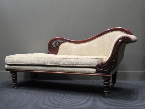 Lot 593 - A Victorian style walnut chaise longue with...