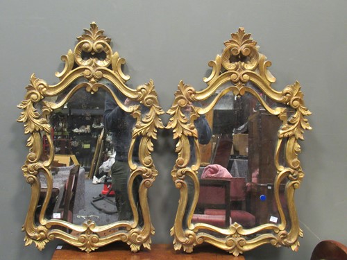 Lot 490 - A pair of gilt framed wall mirrors, 20th...