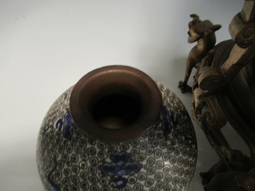 Lot 134 - A cloisonné lamp base with gilt metal mounts...